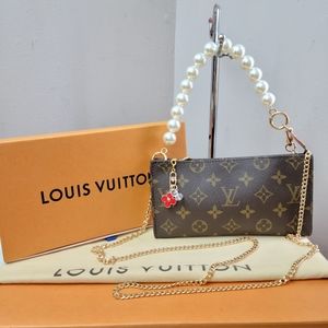 Louis Vuitton Brown Monogram Clutch with Gold Chain